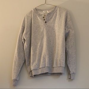 grey crew neck with 3 buttons